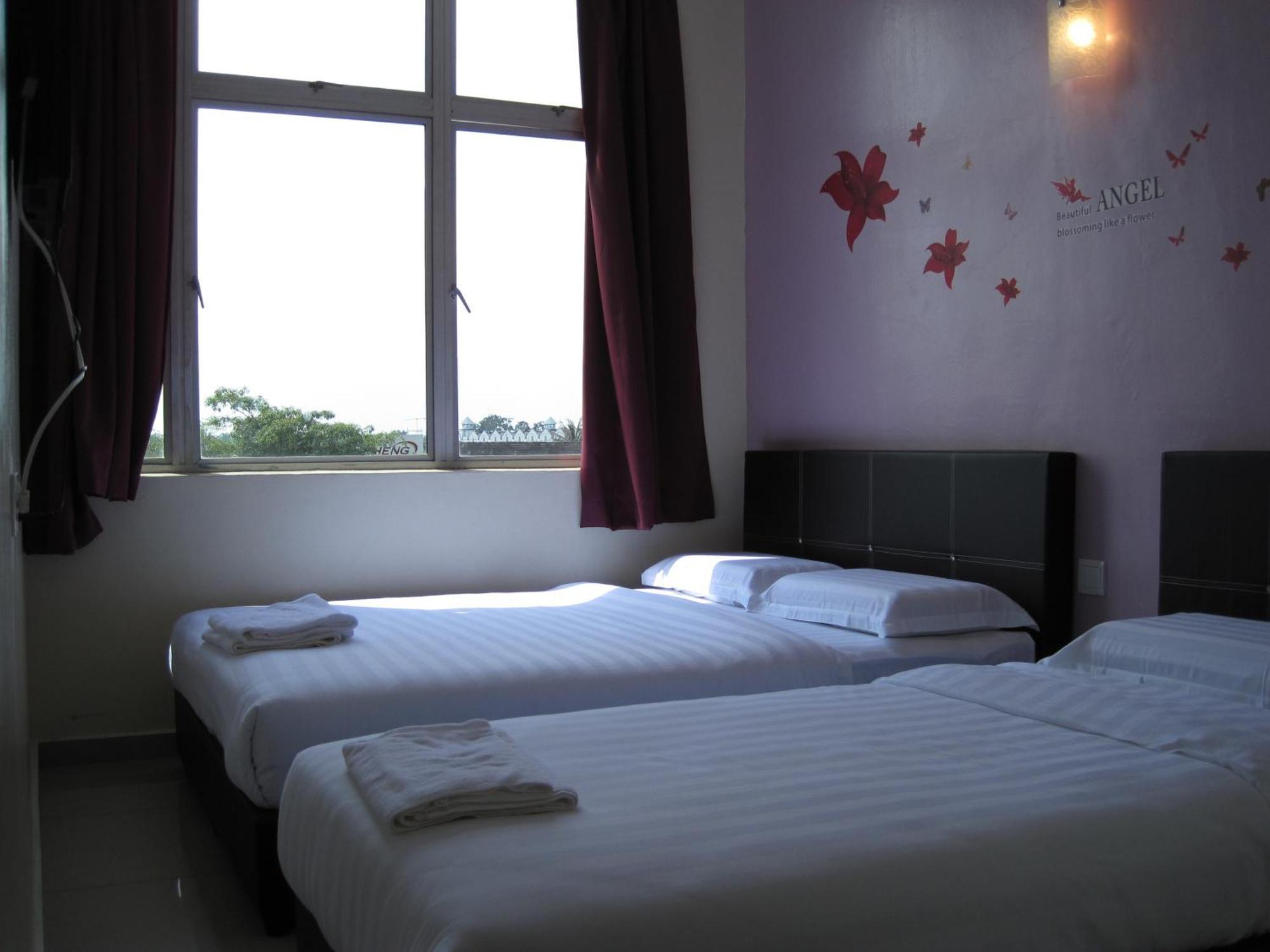 Max Inn Hotel Parit Raja Værelse billede